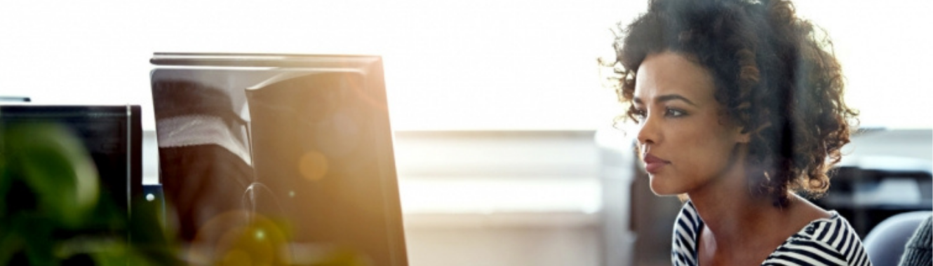 woman reading something on a computer